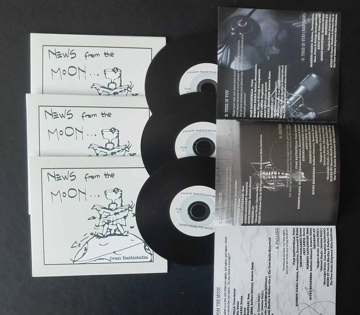 black vinyl cd replication with cardboard and booklets